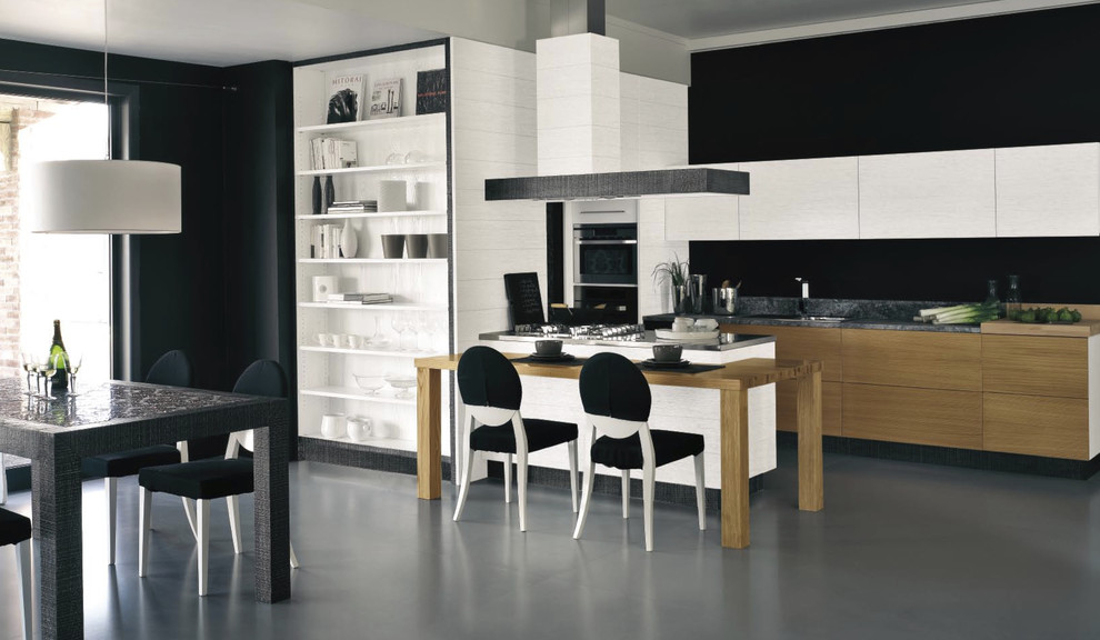 Foto di una cucina abitabile minimal con ante lisce e ante in legno scuro