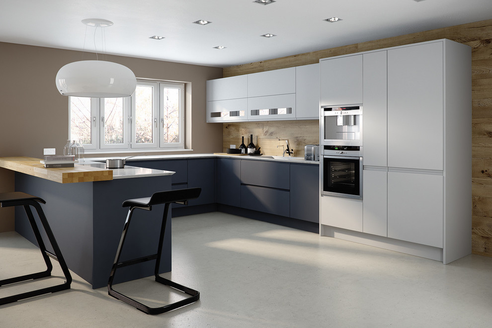 Large minimalist u-shaped eat-in kitchen photo in Other with an undermount sink, flat-panel cabinets, blue cabinets, wood backsplash, stainless steel appliances and a peninsula