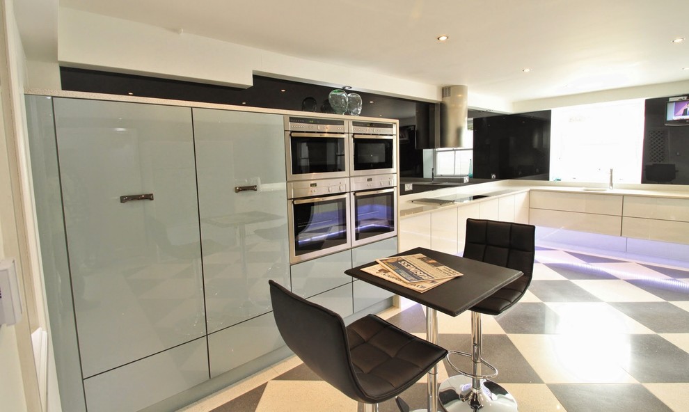 Example of a minimalist kitchen design in Hampshire