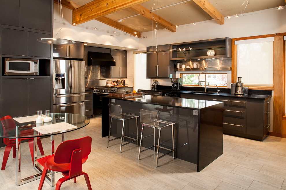 Contemporary kitchen in Atlanta with stainless steel appliances.