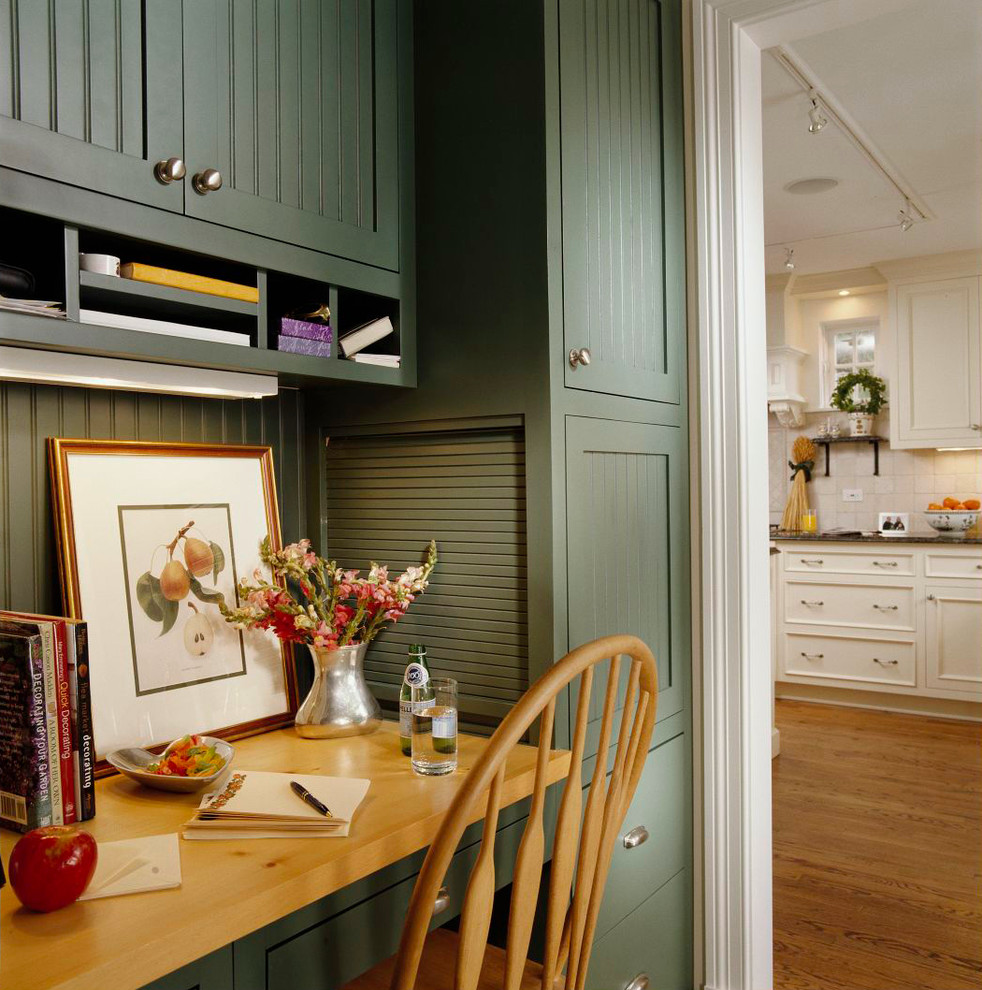 Design ideas for a traditional kitchen in Chicago with green cabinets.