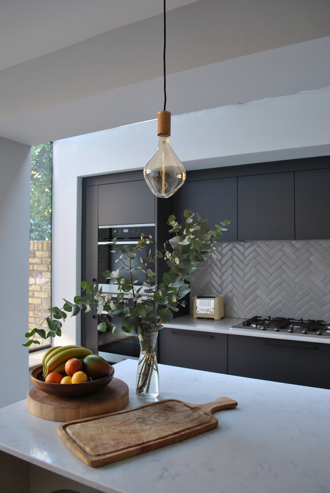 Modern dark grey kitchen with black handles - Contemporary - Kitchen ...