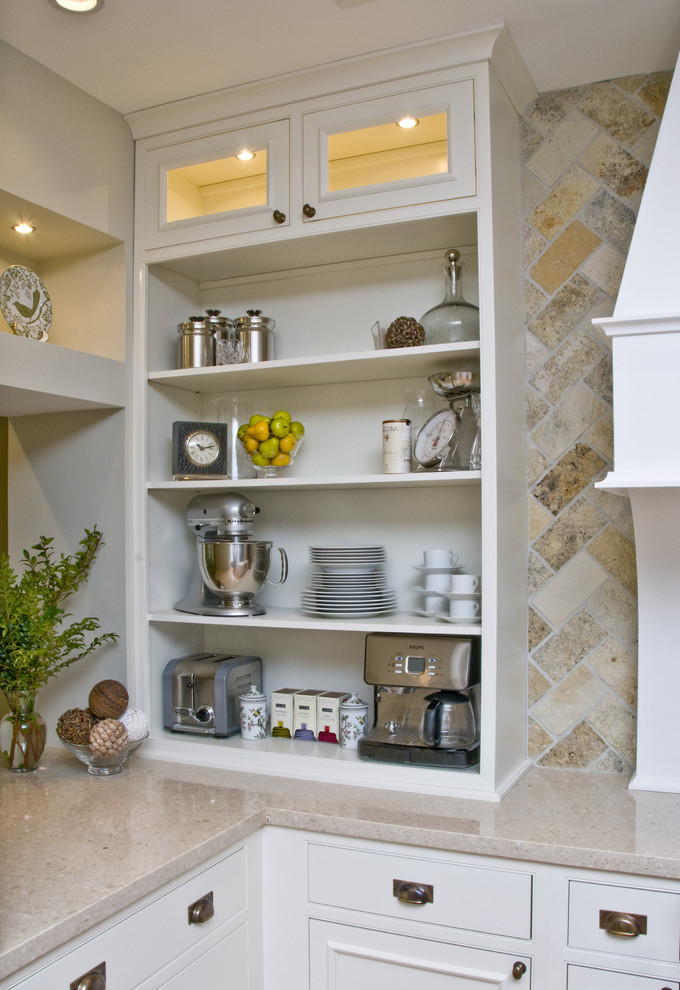 Inspiration for a large timeless galley light wood floor kitchen remodel in Chicago with marble countertops, open cabinets, white cabinets, multicolored backsplash, a farmhouse sink, stainless steel appliances, an island and limestone backsplash