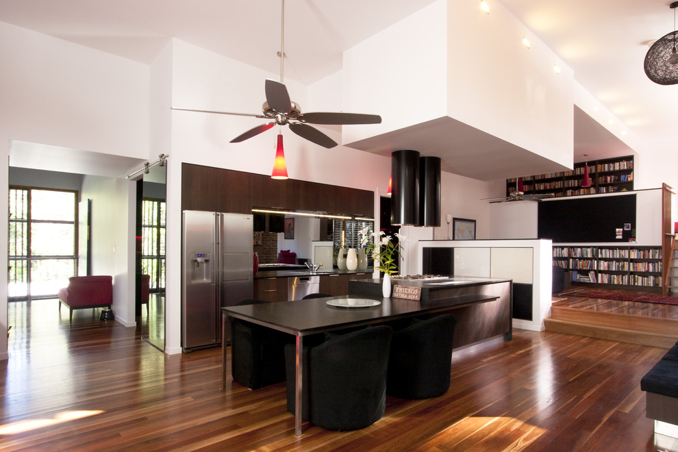 Example of a minimalist kitchen design in Brisbane with stainless steel appliances
