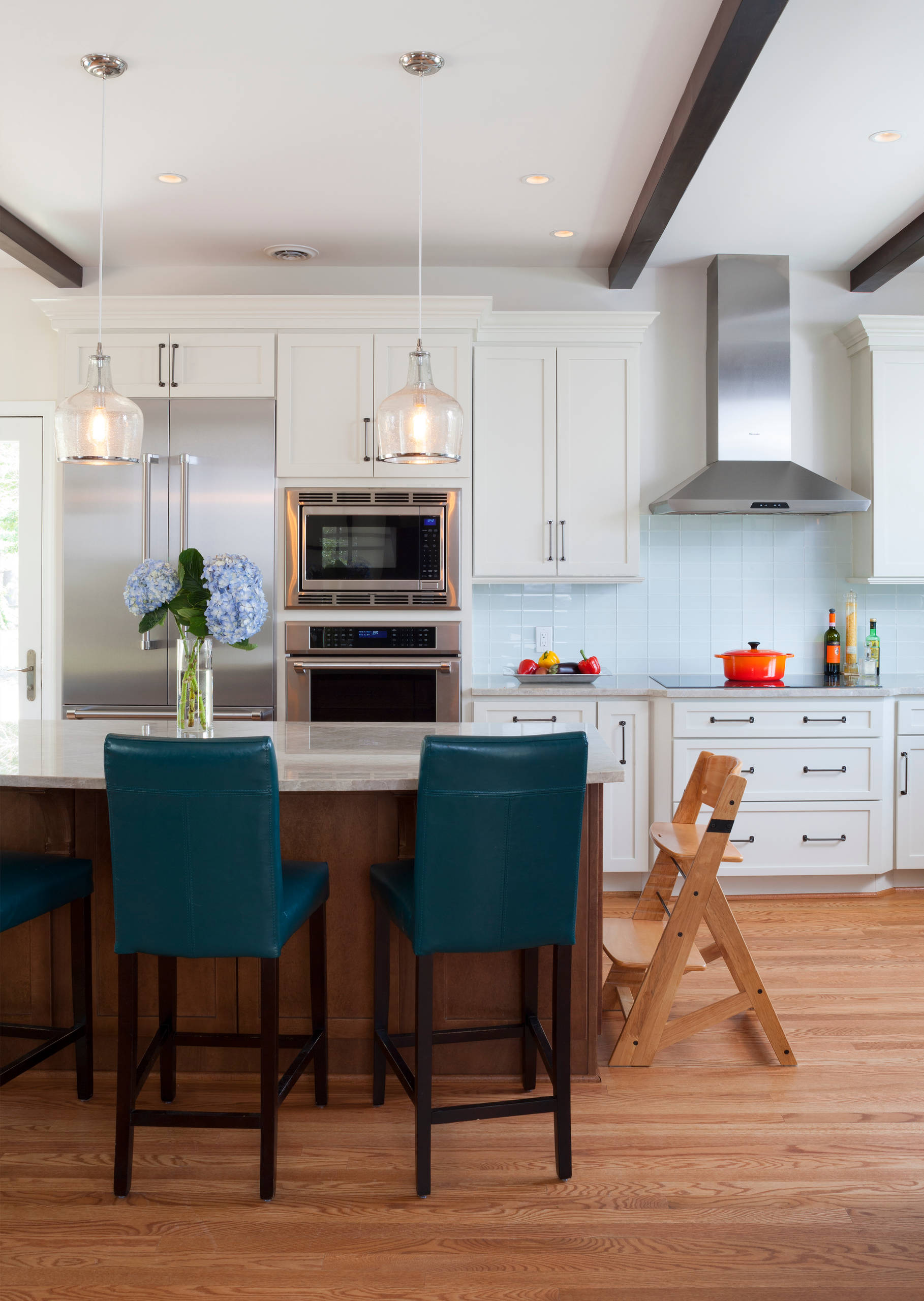 Gorgeous two story kitchen, granite countertops, pendant lighting, blue  mosaic backsplash tile, g…