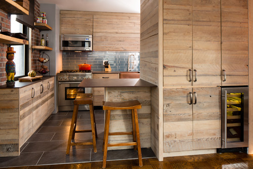 Modern rustic kitchen with engineered wood cabinets, built-in wine cooler, and tiled backsplash design