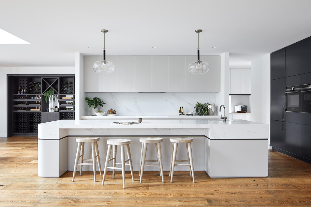Design ideas for a large contemporary galley kitchen in Melbourne with an island.