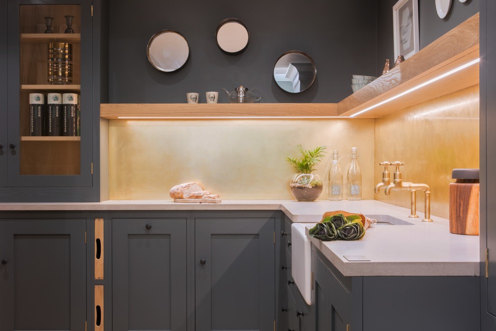 Inspiration for a small urban l-shaped enclosed kitchen in Other with a belfast sink, shaker cabinets, grey cabinets, engineered stone countertops, metallic splashback, metal splashback and no island.