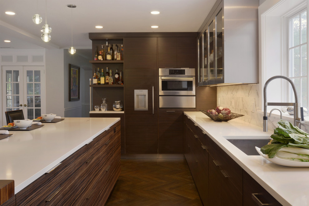 Inspiration for a huge contemporary u-shaped dark wood floor and brown floor eat-in kitchen remodel in New York with an undermount sink, flat-panel cabinets, dark wood cabinets, quartz countertops, multicolored backsplash, stone tile backsplash, stainless steel appliances and an island