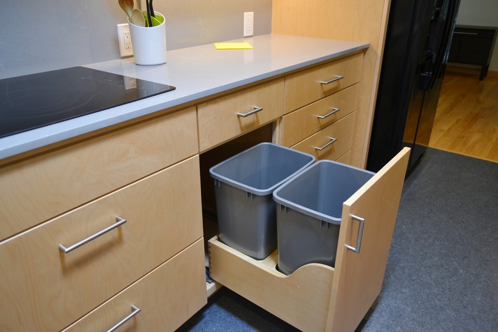 Example of a small minimalist galley linoleum floor eat-in kitchen design in San Francisco with an undermount sink, flat-panel cabinets, light wood cabinets, quartz countertops, gray backsplash and no island