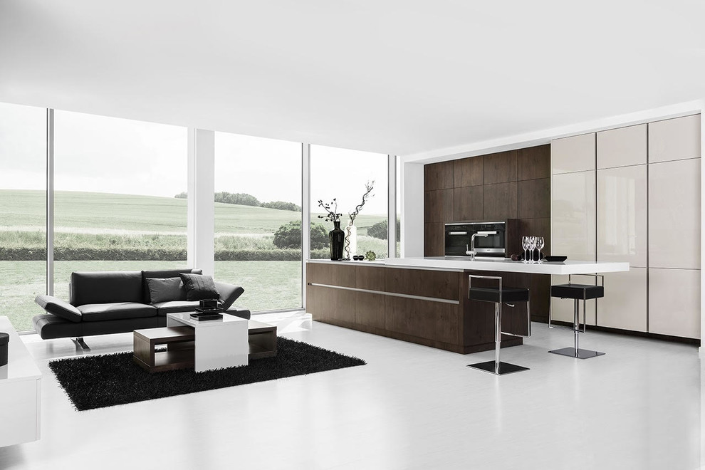 Immagine di una grande cucina moderna con ante lisce, ante in legno bruno, top in superficie solida, pavimento in cemento e pavimento bianco