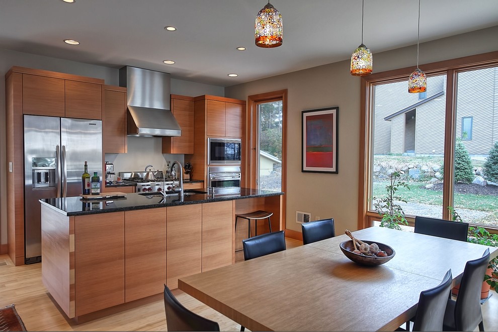 Contemporary kitchen in Minneapolis with stainless steel appliances.