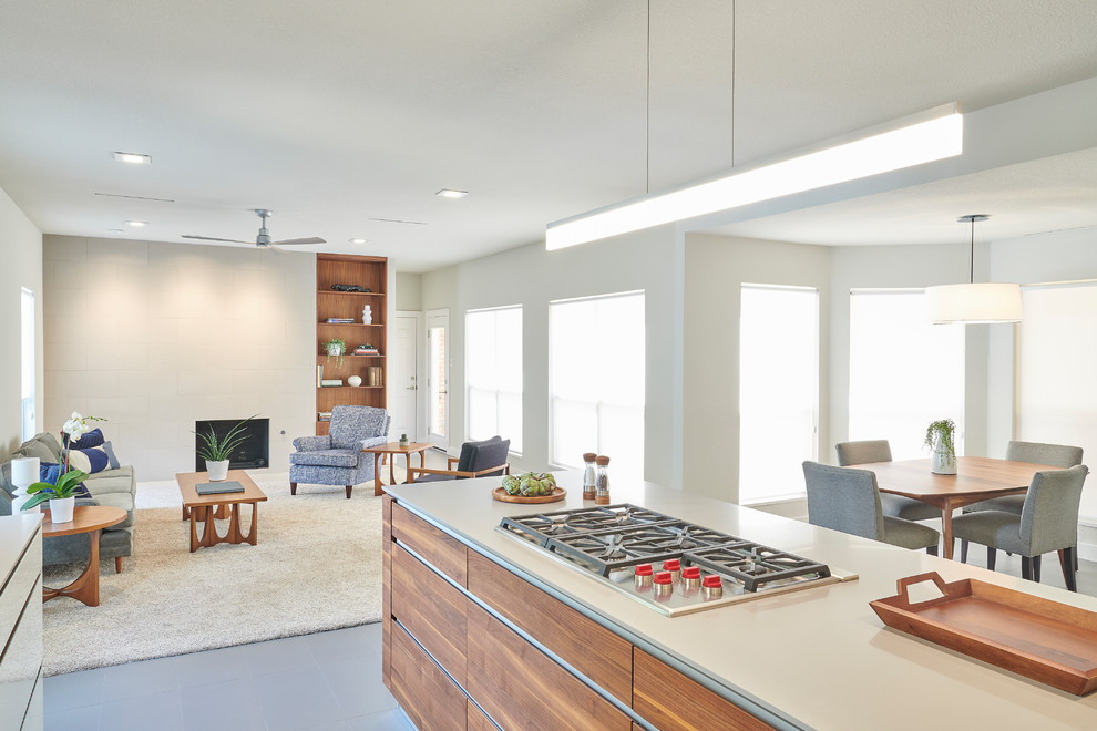 На фото: кухня в стиле модернизм с полом из керамогранита и серым полом с