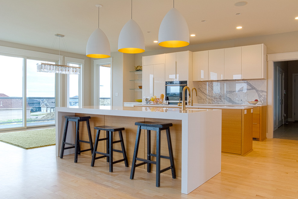 Example of a huge minimalist light wood floor eat-in kitchen design in Other with a single-bowl sink, white cabinets, quartz countertops, white backsplash, marble backsplash, black appliances and two islands