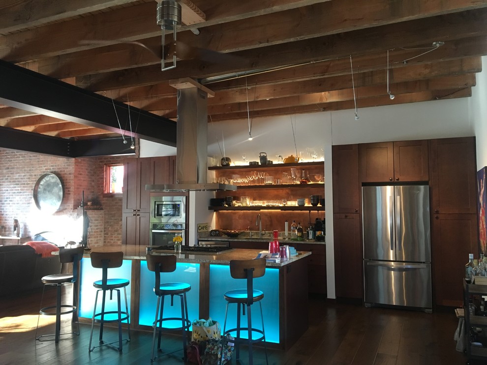 Urban eat-in kitchen photo in St Louis with an island