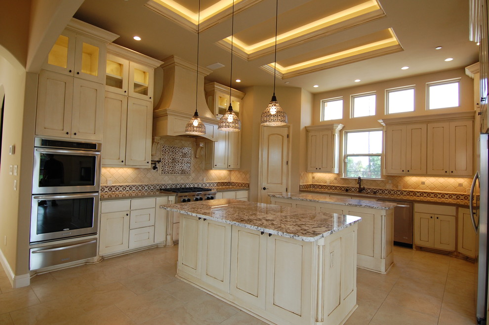 Example of a tuscan kitchen design in Dallas