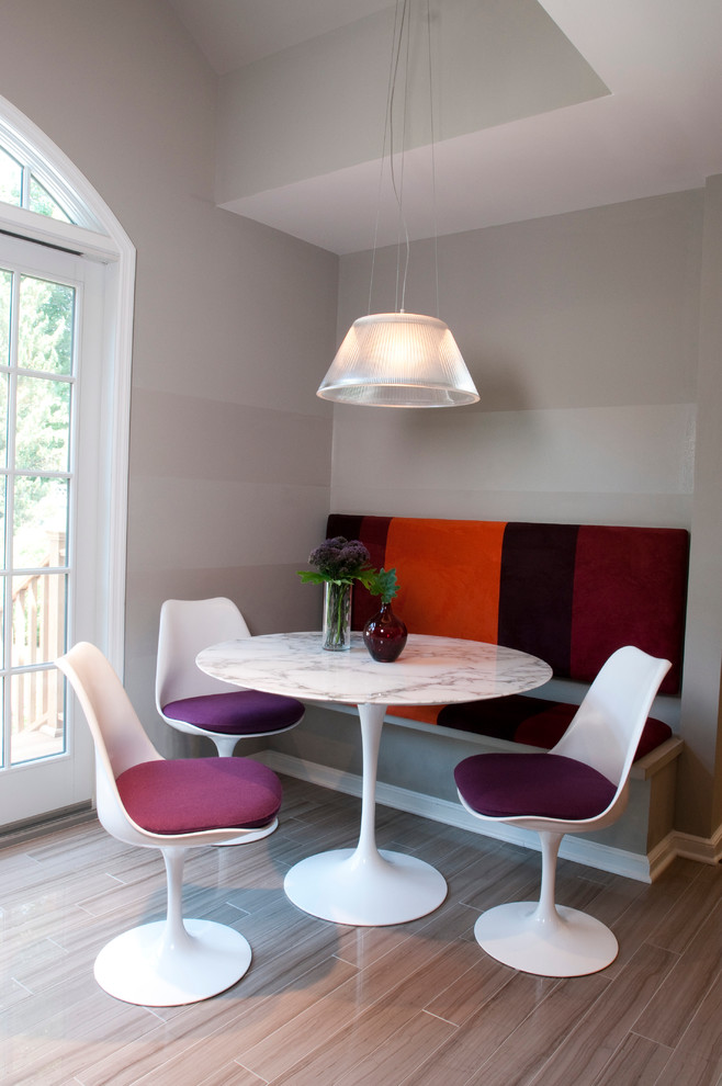 Large modern kitchen/dining room in New York with marble flooring.