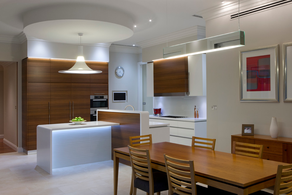 Eat-in kitchen - contemporary eat-in kitchen idea in Canberra - Queanbeyan with flat-panel cabinets and dark wood cabinets