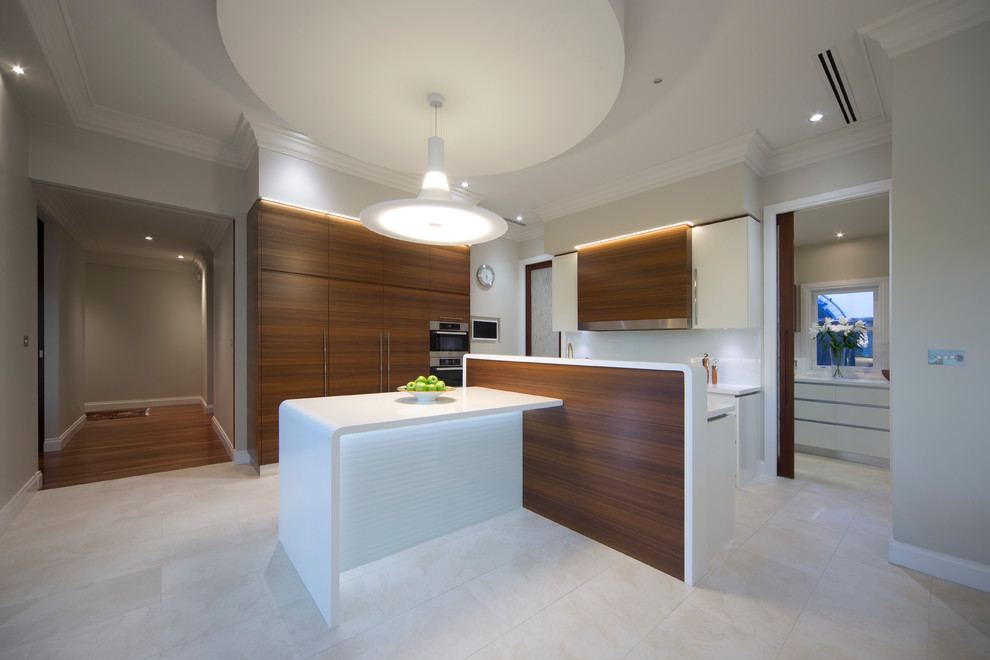 Photo of a contemporary kitchen/diner in Canberra - Queanbeyan with flat-panel cabinets and medium wood cabinets.