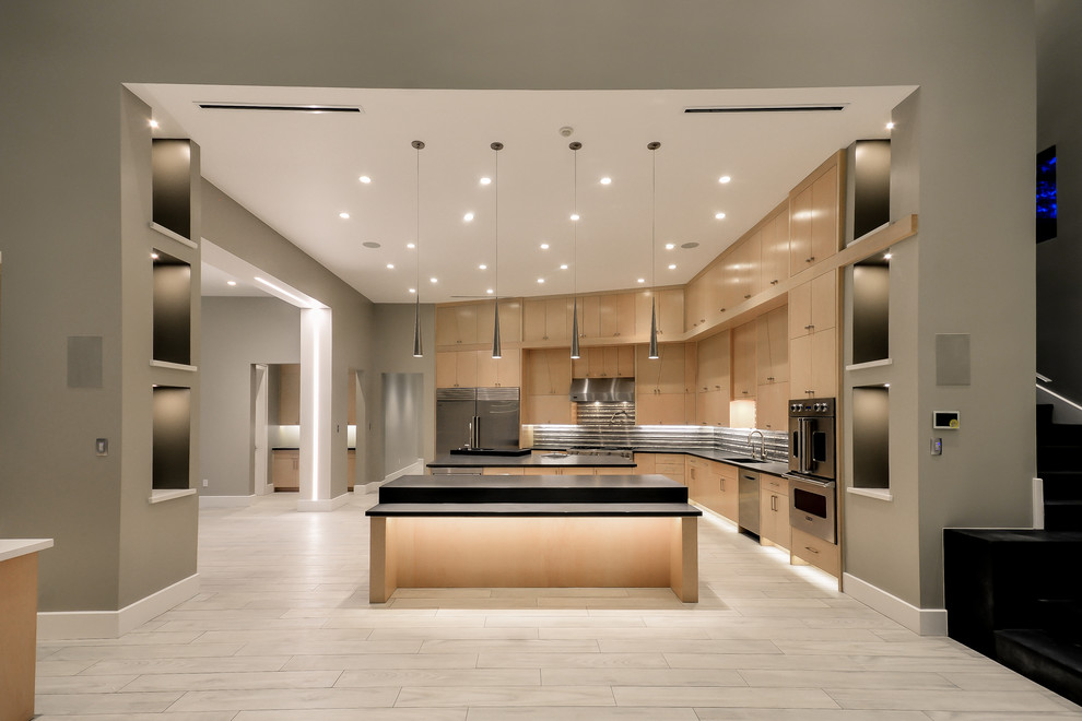 Design ideas for a large contemporary l-shaped open plan kitchen in Houston with an integrated sink, flat-panel cabinets, medium wood cabinets, engineered stone countertops, multi-coloured splashback, glass tiled splashback, stainless steel appliances, porcelain flooring and multiple islands.