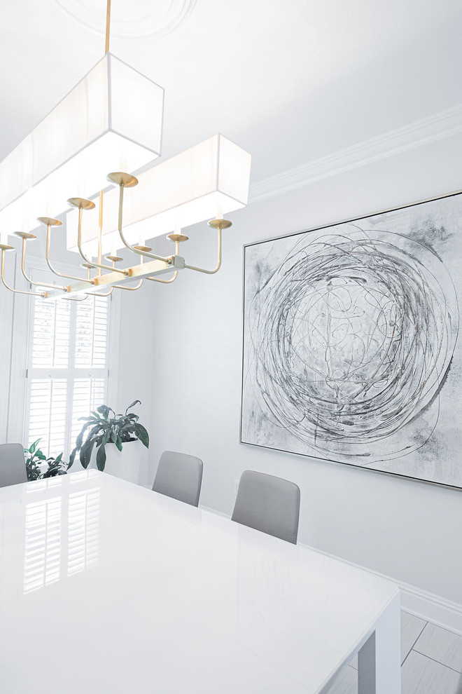 Example of a large minimalist u-shaped porcelain tile and gray floor kitchen design in Other with a farmhouse sink, gray cabinets, marble countertops, gray backsplash, marble backsplash, stainless steel appliances, an island and multicolored countertops