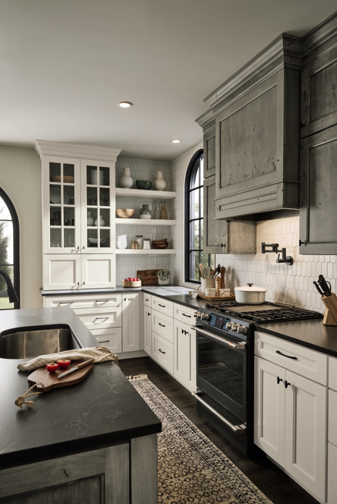 Inspiration for a classic u-shaped kitchen in Other with a single-bowl sink, flat-panel cabinets, medium wood cabinets, engineered stone countertops, white splashback, porcelain splashback, black appliances, dark hardwood flooring, an island, brown floors and black worktops.