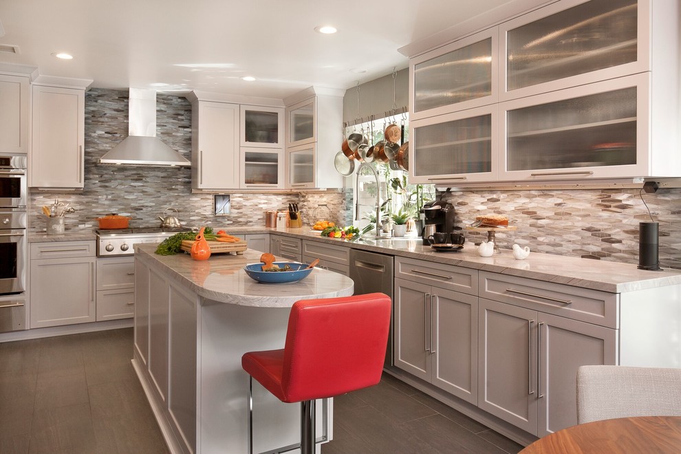 Eat-in kitchen - transitional l-shaped gray floor eat-in kitchen idea in Los Angeles with shaker cabinets, gray cabinets, multicolored backsplash, stainless steel appliances, an island and gray countertops
