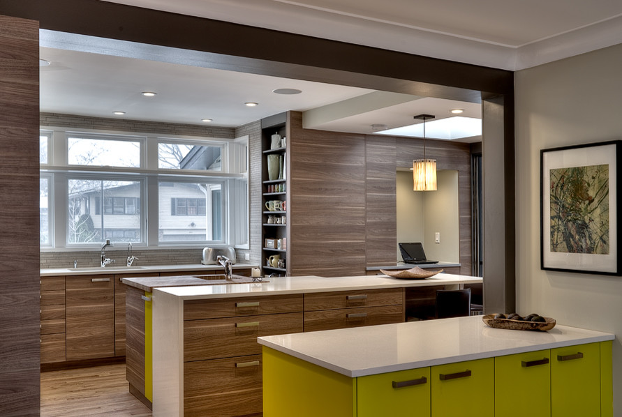 Example of a large trendy u-shaped medium tone wood floor and brown floor eat-in kitchen design in Chicago with an undermount sink, flat-panel cabinets, medium tone wood cabinets, quartz countertops, beige backsplash, mosaic tile backsplash, stainless steel appliances and an island