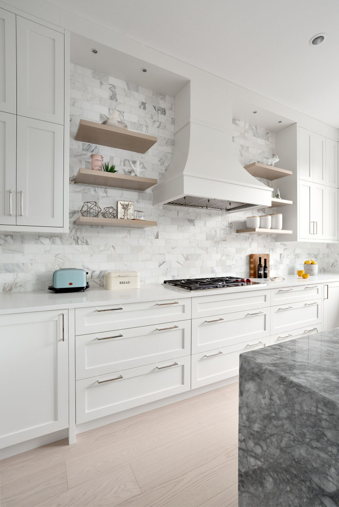 Inspiration for a small modern u-shaped kitchen/diner in Vancouver with a single-bowl sink, shaker cabinets, white cabinets, engineered stone countertops, multi-coloured splashback, ceramic splashback, stainless steel appliances, plywood flooring, an island, beige floors and grey worktops.