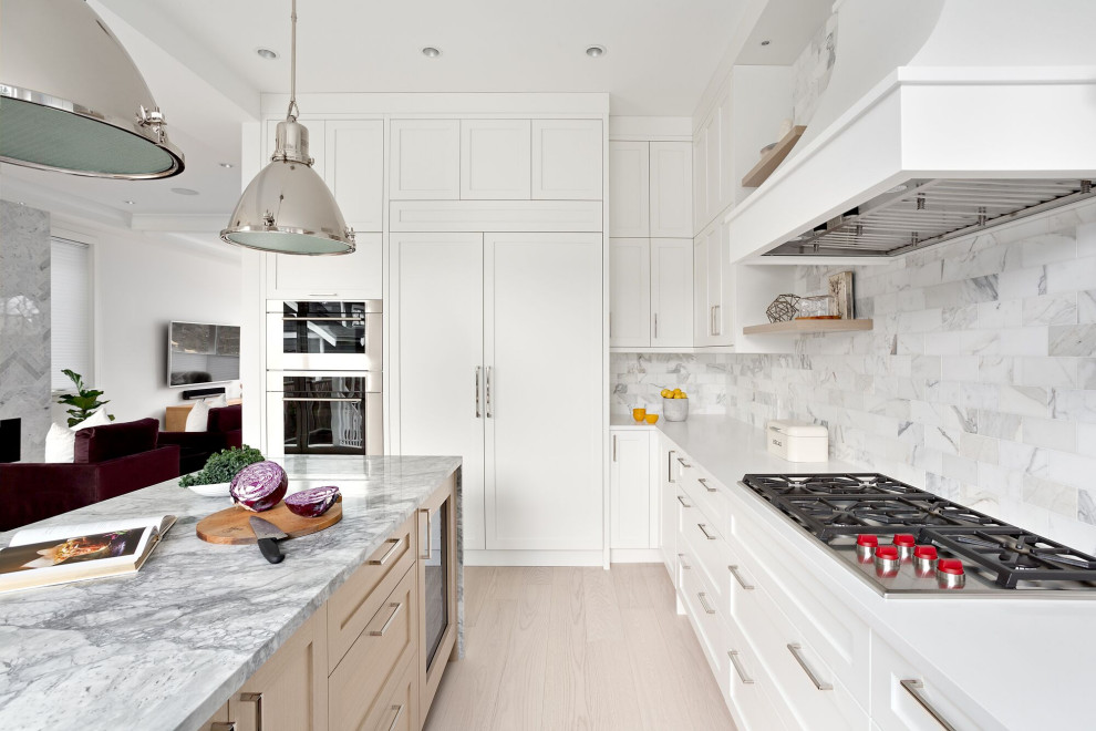 This is an example of a small modern u-shaped kitchen/diner in Vancouver with a single-bowl sink, shaker cabinets, white cabinets, engineered stone countertops, multi-coloured splashback, ceramic splashback, stainless steel appliances, plywood flooring, an island, beige floors and grey worktops.