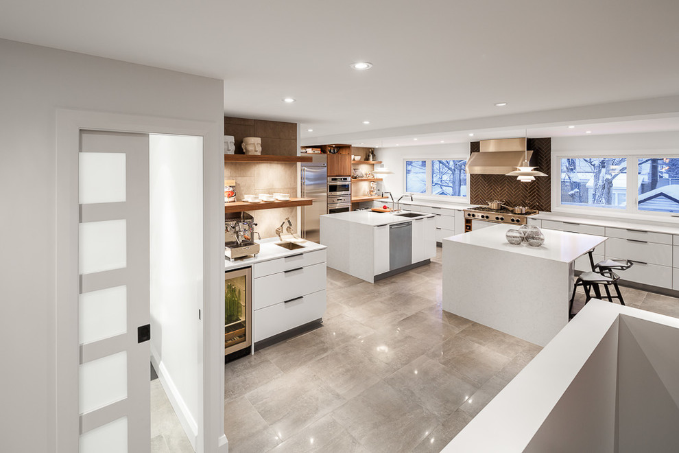 Eat-in kitchen - contemporary eat-in kitchen idea in Ottawa with an undermount sink, flat-panel cabinets, white cabinets, quartz countertops, black backsplash, subway tile backsplash and stainless steel appliances