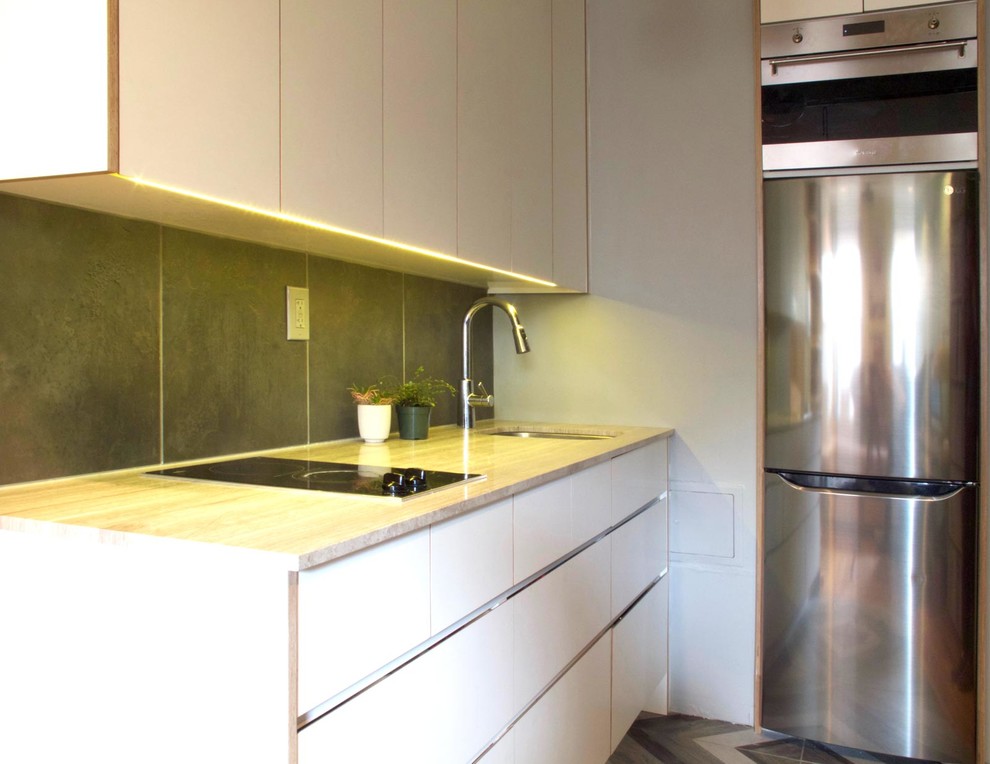 Источник вдохновения для домашнего уюта: кухня в стиле модернизм с плоскими фасадами