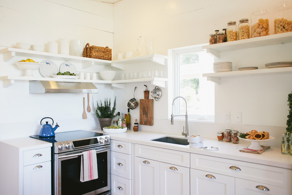 Inspiration for a small farmhouse l-shaped kitchen/diner in Los Angeles with a submerged sink, shaker cabinets, white cabinets and no island.