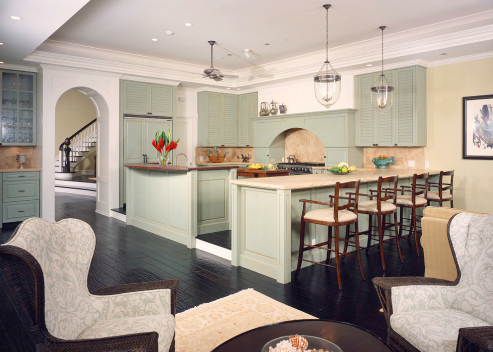 Kitchen - tropical kitchen idea in Tampa with louvered cabinets and green cabinets
