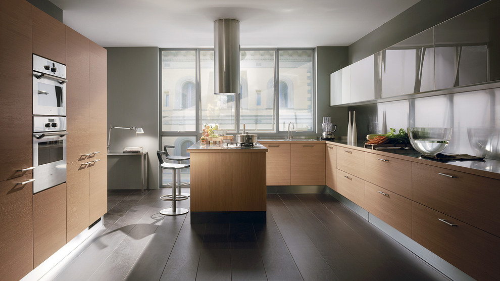 Eat-in kitchen - large modern u-shaped dark wood floor eat-in kitchen idea in Melbourne with a double-bowl sink, raised-panel cabinets, medium tone wood cabinets, quartzite countertops, glass sheet backsplash, stainless steel appliances and two islands