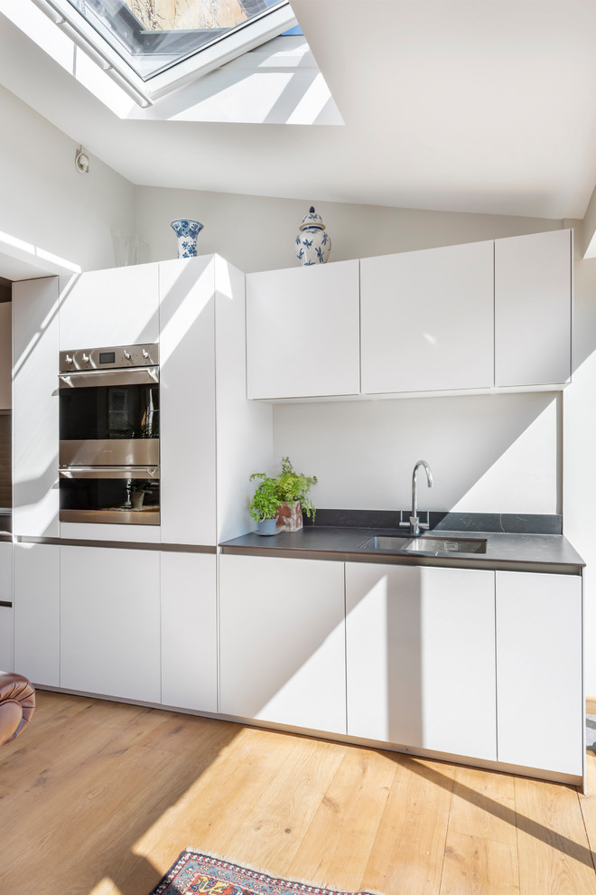 Свежая идея для дизайна: большая прямая кухня-гостиная в стиле модернизм - отличное фото интерьера