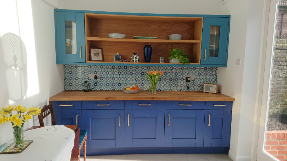 Example of a tuscan kitchen design in London