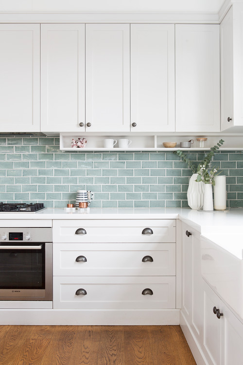 Shake it Up: White Shaker Cabinets and a Green Subway Tile Backsplash Fiesta