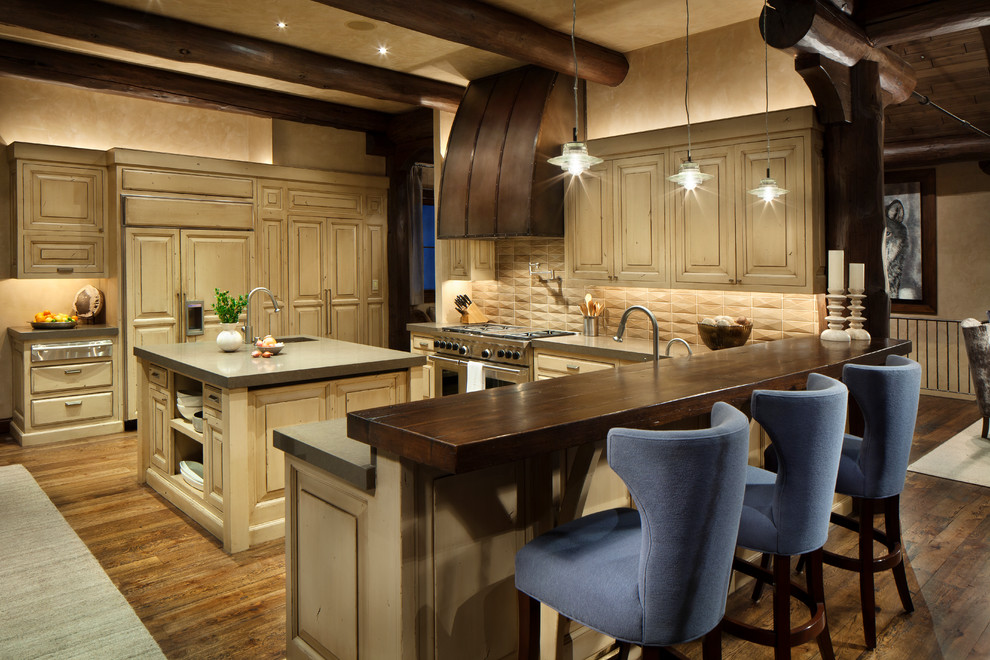 Inspiration for a rustic kitchen remodel in Other with raised-panel cabinets