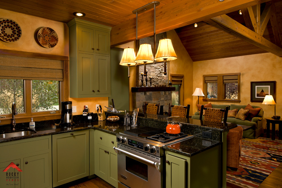 Example of a mid-sized mountain style l-shaped open concept kitchen design in Other with recessed-panel cabinets, medium tone wood cabinets and an island
