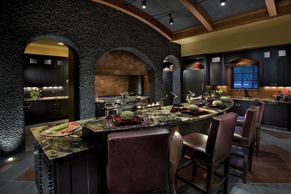 Enclosed kitchen - large contemporary u-shaped ceramic tile enclosed kitchen idea in Phoenix with shaker cabinets, black cabinets, granite countertops, brown backsplash, ceramic backsplash, stainless steel appliances and an island
