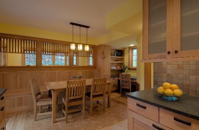 Mid-sized arts and crafts l-shaped cork floor eat-in kitchen photo in Minneapolis with shaker cabinets, medium tone wood cabinets, quartz countertops, multicolored backsplash, stone tile backsplash, stainless steel appliances and no island