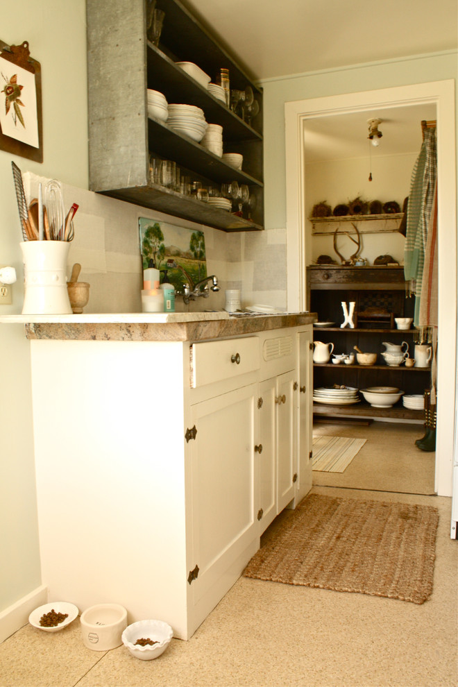 Kitchen - traditional kitchen idea in San Francisco with open cabinets