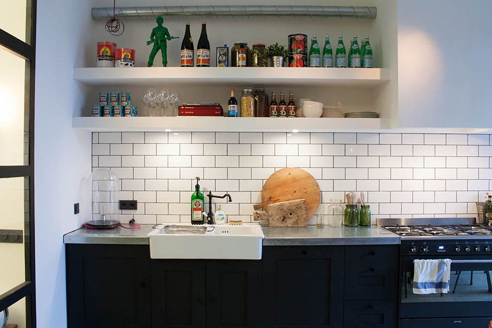 Eclectic single-wall kitchen photo in Amsterdam with open cabinets, white cabinets, white backsplash, subway tile backsplash and black appliances