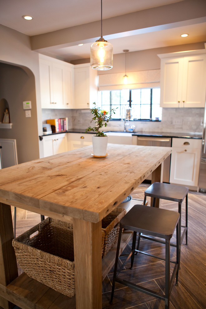 Example of a classic kitchen design in Boston with shaker cabinets