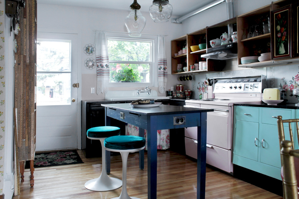 Eclectic kitchen photo in Montreal