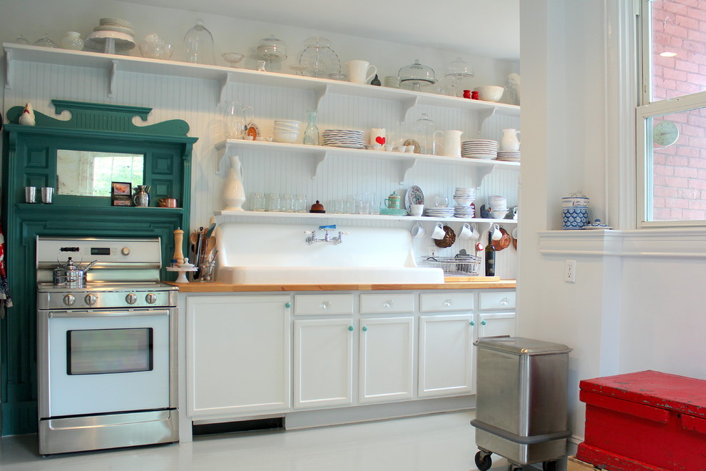 Kitchen - traditional kitchen idea in Philadelphia with wood countertops, a drop-in sink, shaker cabinets and white cabinets