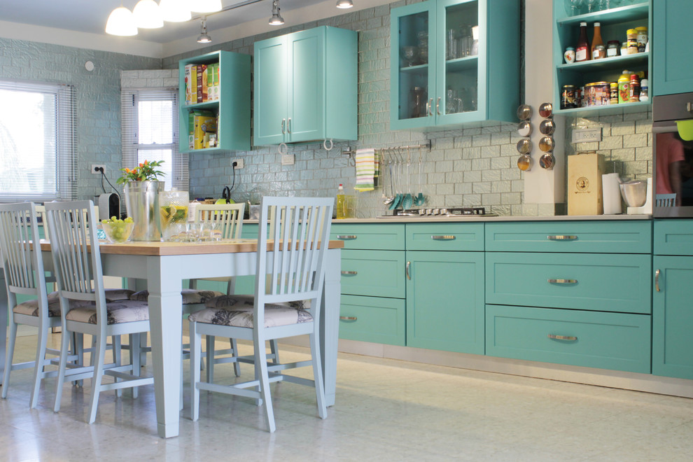 Kitchen - contemporary kitchen idea in Tel Aviv with turquoise cabinets