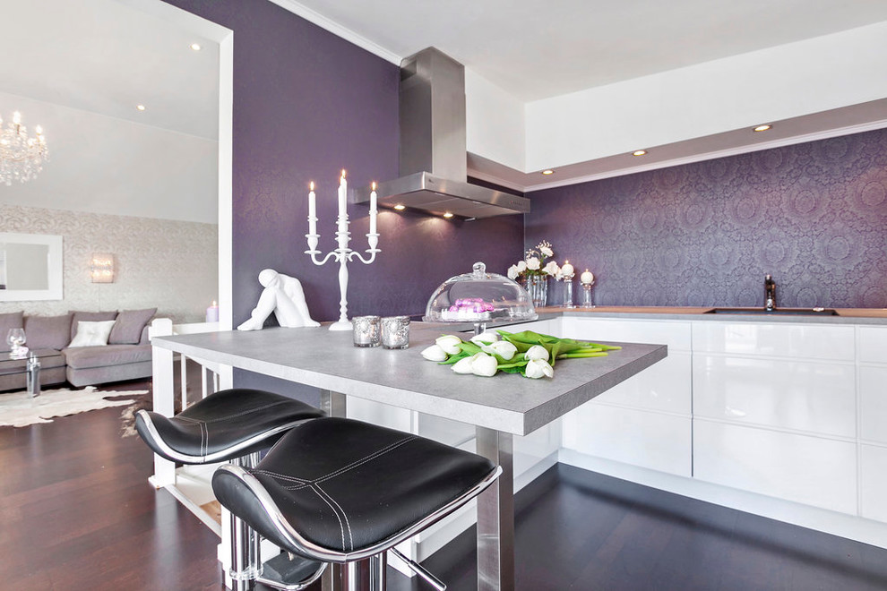Trendy kitchen photo in Other with flat-panel cabinets and white cabinets