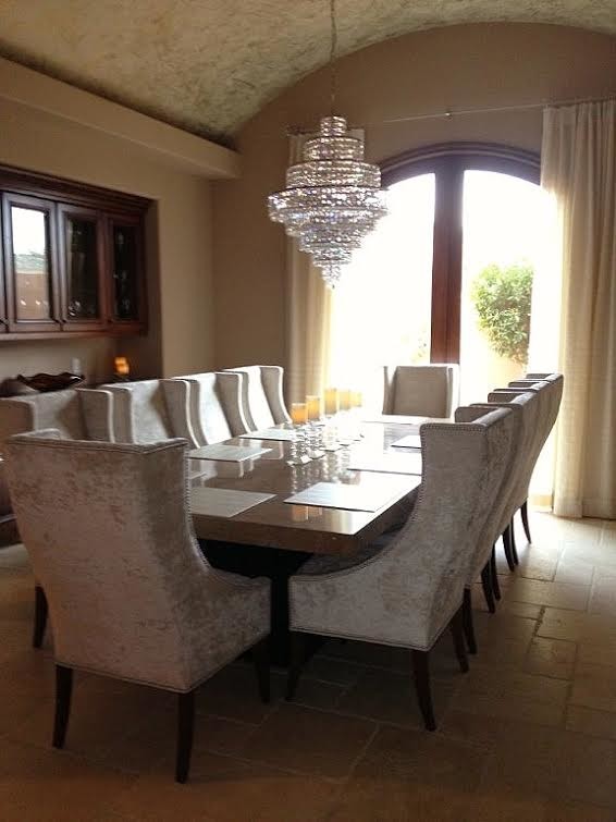 This is an example of a medium sized contemporary kitchen/dining room in Phoenix with travertine flooring.